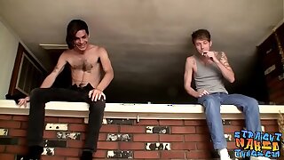 Handsome thugs tugging their hairy cocks passionately