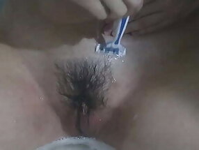 Daughter shaving her pussy!